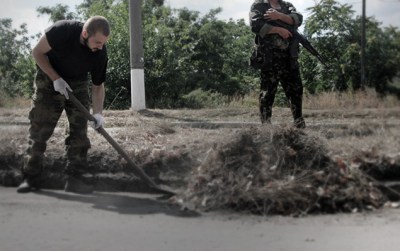 "In this captivity you are neither beaten nor tortured, but fed." Photo: Aleksandr KOTS Dmitriy STESHIN